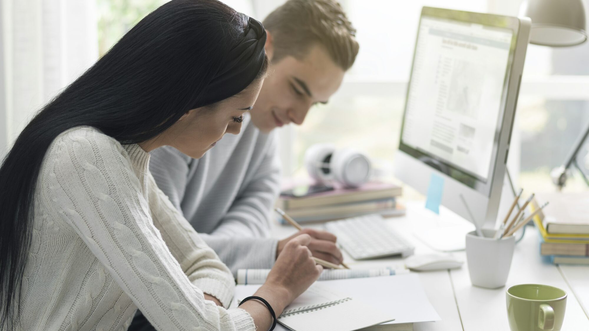 Students studying together at the library